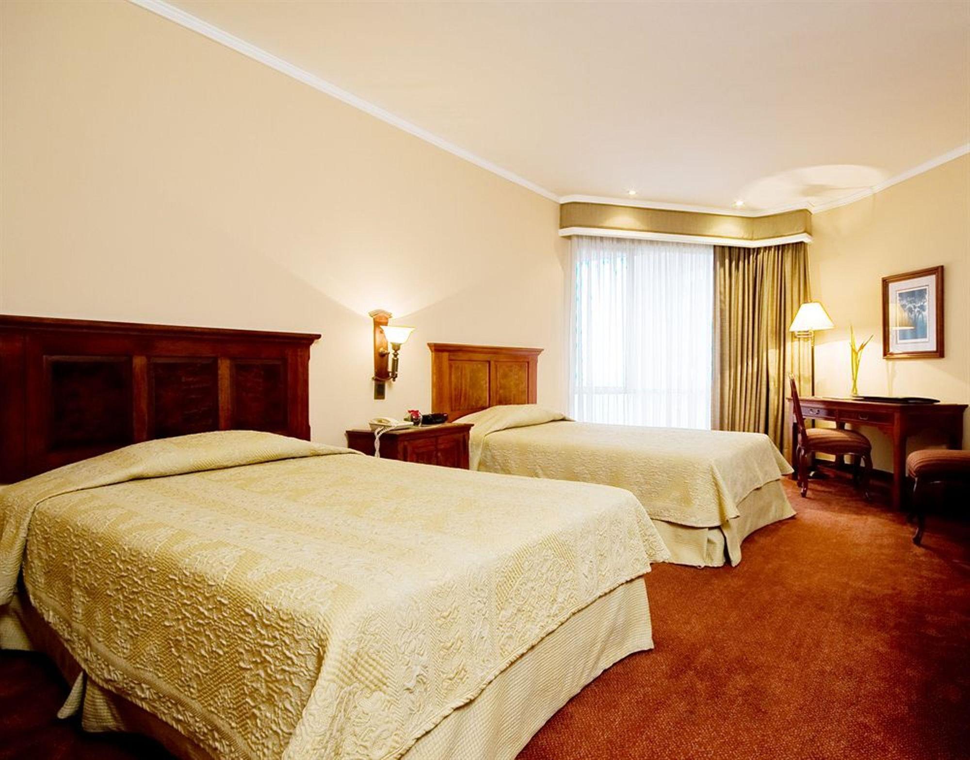Hotel Dann Carlton Belfort Медельїн Екстер'єр фото A room at the hotel
